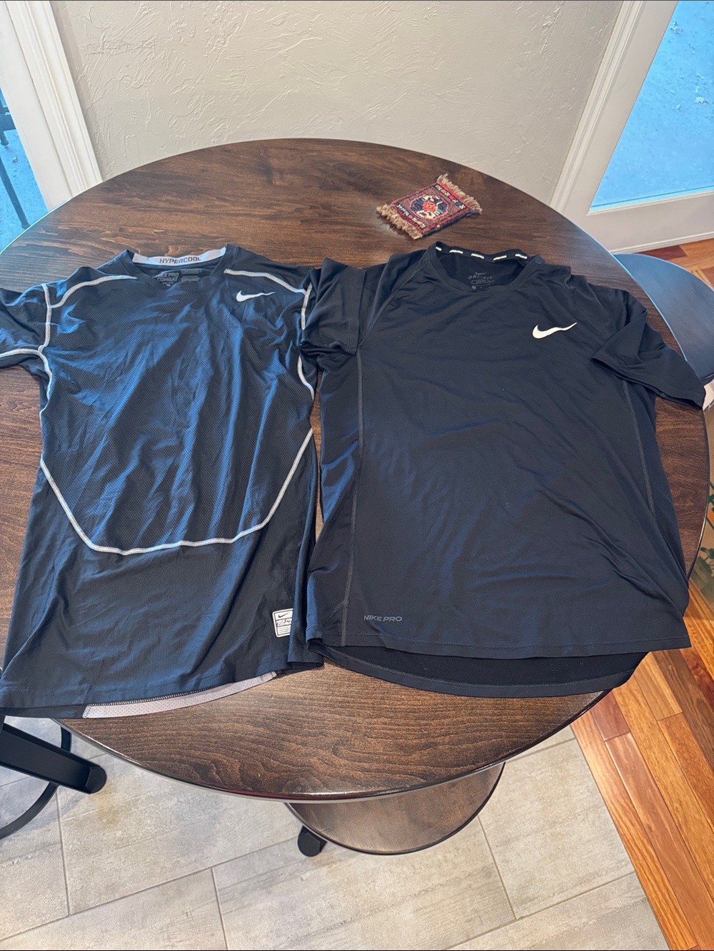 Nike Men’s Black Short Sleeve Athletic Tee with White Swoosh